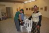 Members of the 'The Fruits of Peace Association in Israel' organizing their exhibition 'The Life as Desert - the Desert as Life' in the 'Tziurim' Art Gallery of the Kibbutz Urim, Negev, July 2011