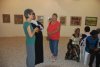 Members of the 'The Fruits of Peace Association in Israel' organizing their exhibition 'The Life as Desert - the Desert as Life' in the 'Tziurim' Art Gallery of the Kibbutz Urim, Negev, July 2011