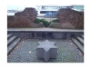 'Down by the Rhine, in the shadow of the Old Rhine Bridge, is a small and moving memorial to a riverside Synagoge that existed here before the war. Now all that remains is a sunken Star of David, and a beautiful and subtle carving of the same from the bricks that I assume must have housed the original Synagogue.'<br>Photo by Antistar<br>Text and photo from Google