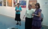 Opening of the "Fruit of Peace in Israel" Associations Exhibition "A Thousand Shades of Color" in the Municipal Library Beersheba on the 20th. of July 2015, in front from right to left: the artist Pnina Barkai, Rahel Dei, Member of The Society for The Blinds, Gina Meir-Duellmann and the musician Wladimir Friedmann. Back: pictures from right to left:  Shula Rapoport and Gina Meir. Photo by Ilan Cohen
