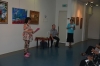 The artist Rahel Polisher reading from her own Poem for the Opening visitors. Photographer : Guillermo Rapoport