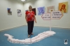 Artist Margalit Bronstein in front of her sculpture "New Way"