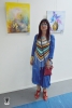 Artist  Ana Miron in front of her picture left. Right picture of the artist Elena Eryomina from Netanya