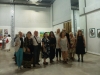 Artists group photo at the opening of their exhibition with the galleries chairwoman in Sankt Petersburg, 17.08. 2018
