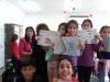 Fruits of Peace in Israel artist Aliza Borshaks workshop in "Painting motivated by Alizas Paintings" for a class of elementary Jewish-Arabic school "Degania", Beersheba, November 2019, with colleague artist Ana Mirons assistance