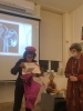 Artist Mrs. Aliza Borshak delivering Association's Certificate for Gina Meir Duellman. 