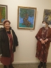 Left to right: Mrs Ester Yossef, member of the "Society for the Blinds" and the Singer for the exhibition's opening. Gina Meir-Duellmann, with one of her oil paintings "Tree of Love" in the middle.